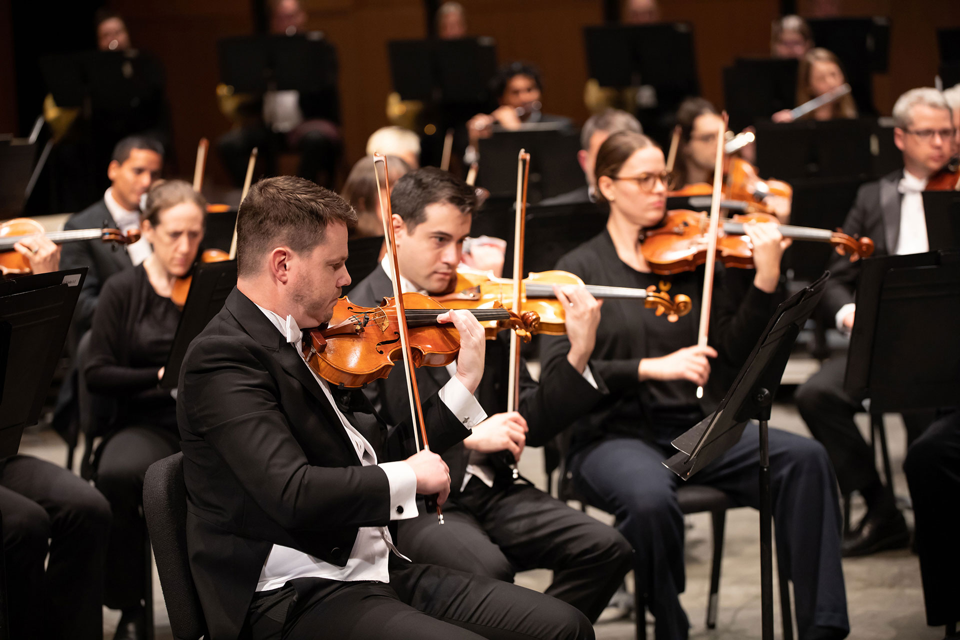 Adult String class graphic; Adults playing violin. 