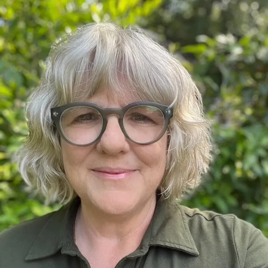 Janet Wilson, Director of Development. 